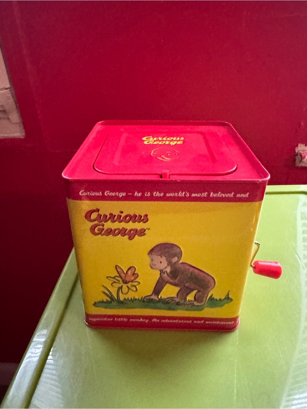 Red and Yellow Wind-Up Tin Bank